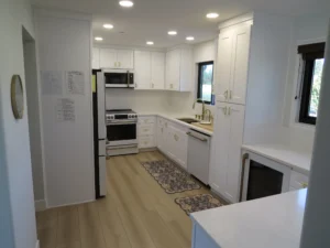 Kitchen with white cabinets and stainless steel appliances